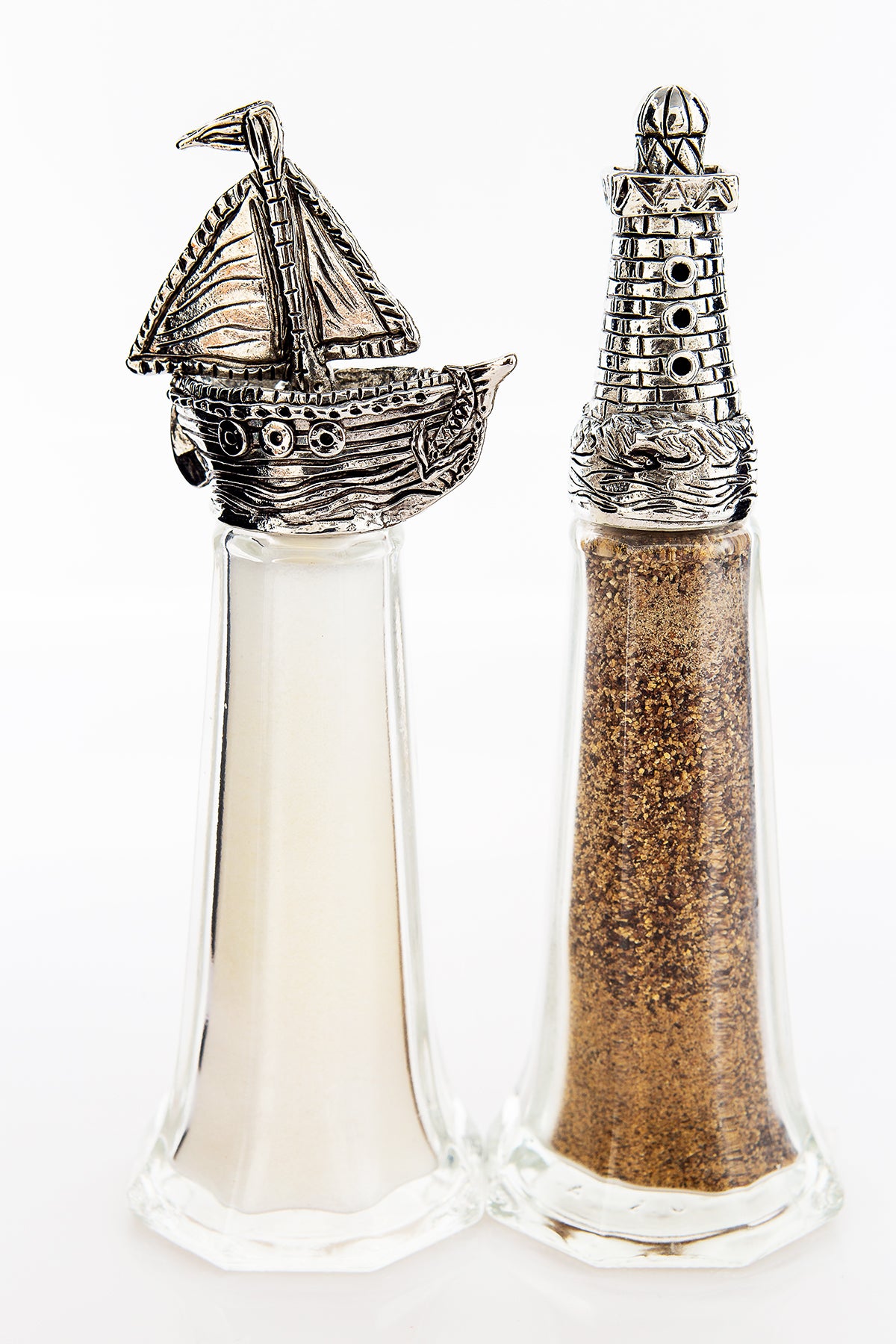 Boat and Lighthouse salt and pepper shaker set, handcrafted by German artist Thomas Leiblein. American pewter, made in the USA.