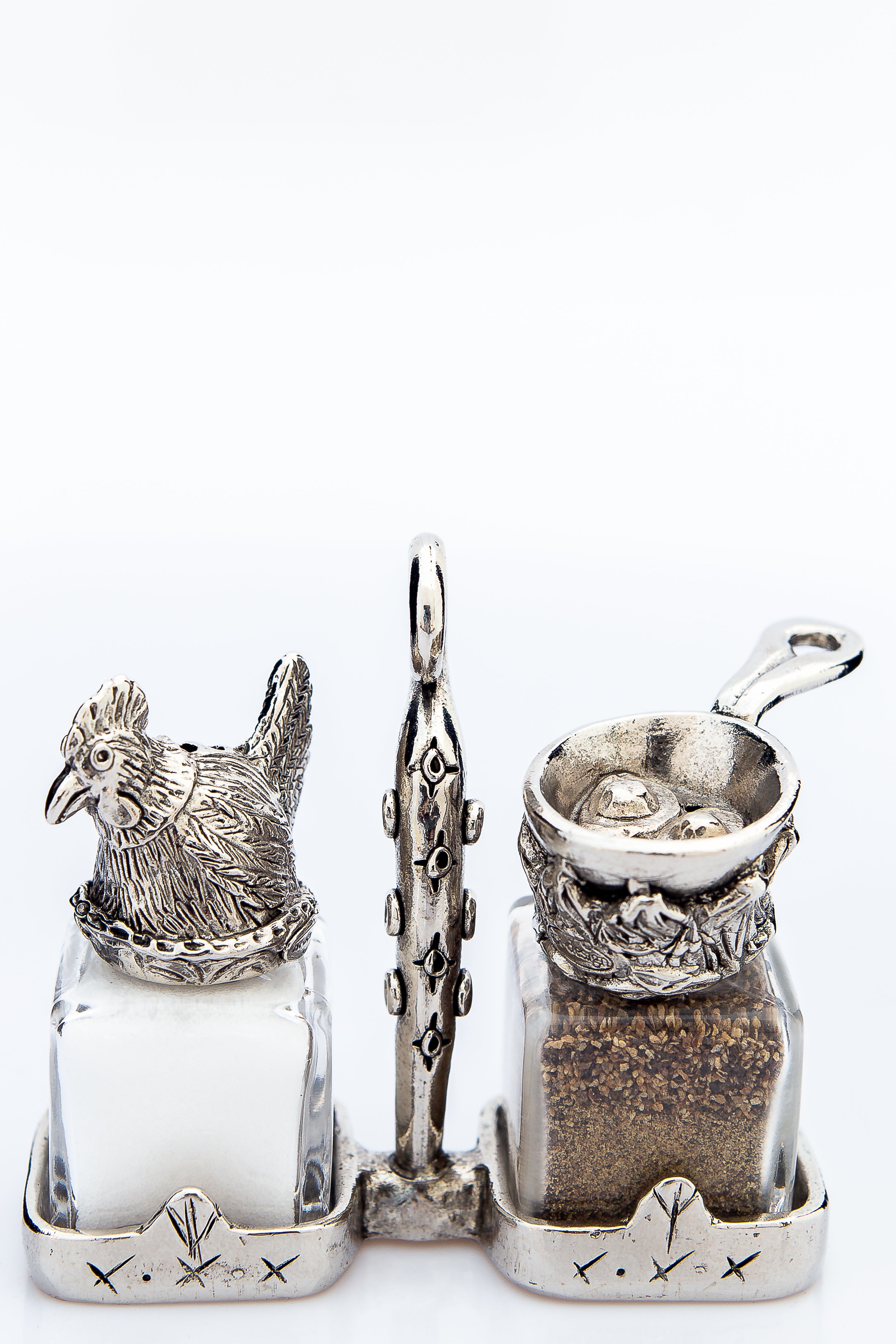Chicken and frying pan salt and pepper shakers with a basket carrier, handcrafted by German artist Thomas Leiblein. American pewter, made in the USA.