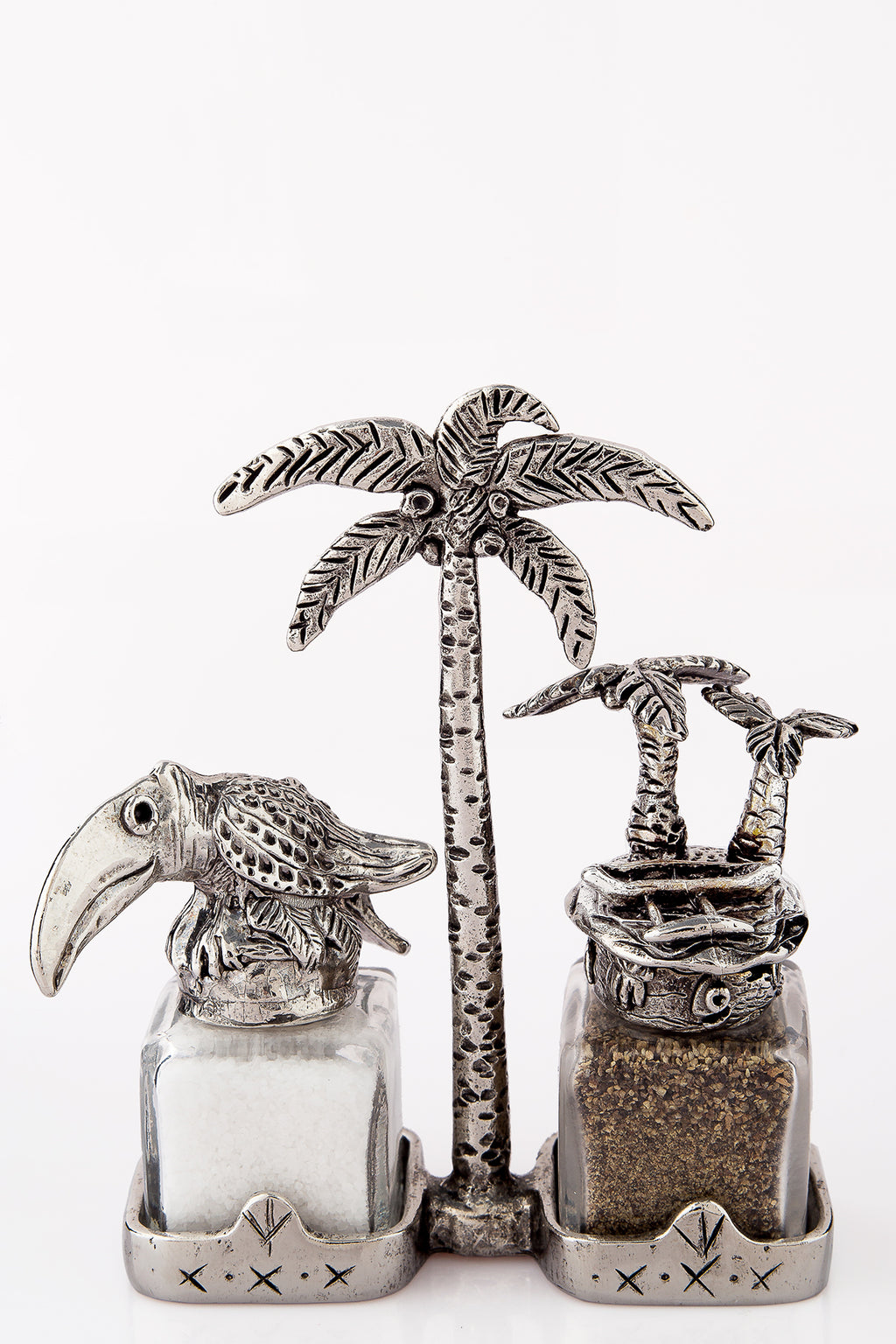 Toucan and Palmtree salt and pepper shakers with a palm-tree carrier, handcrafted by German artist Thomas Leiblein. American pewter, made in the USA.