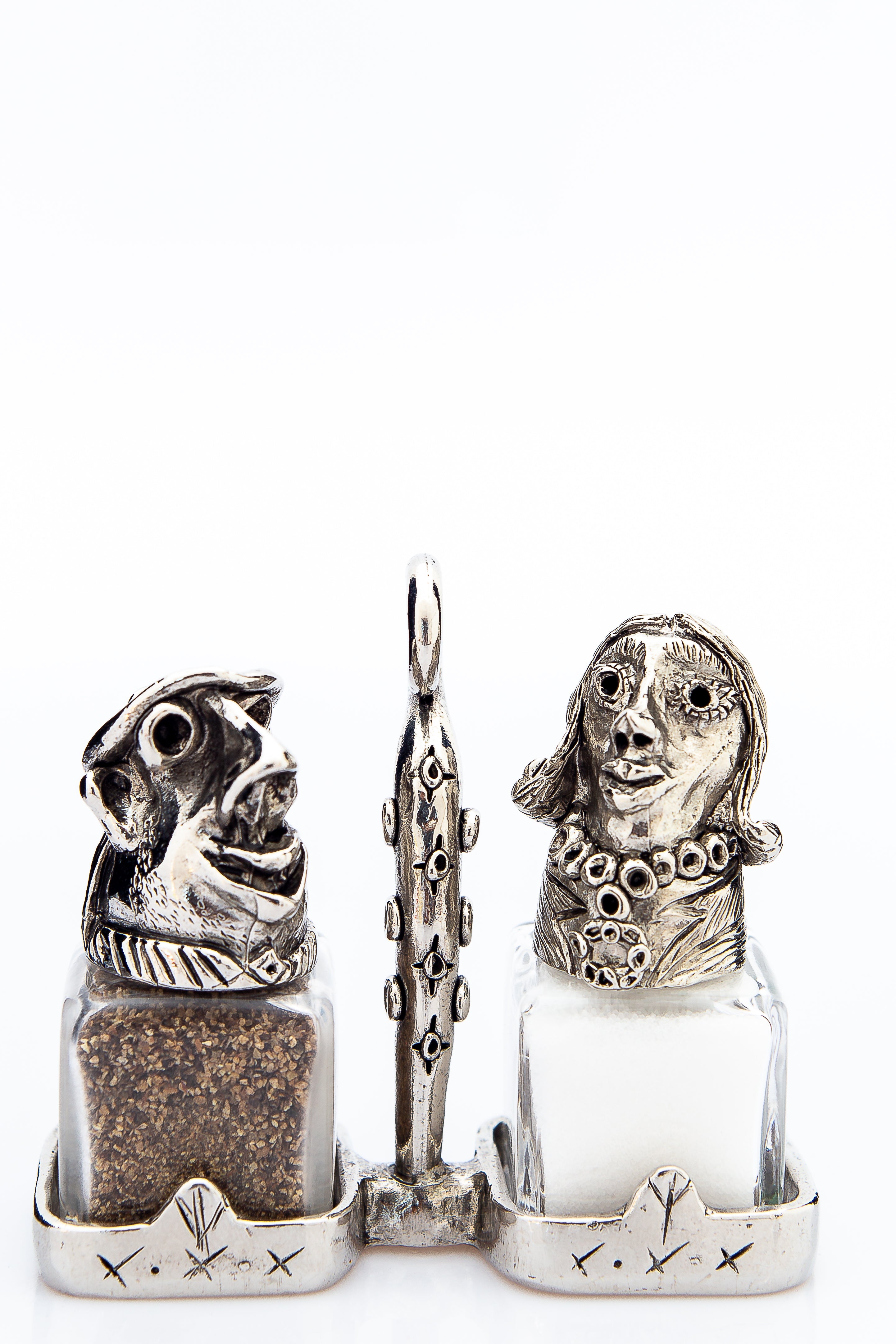 Man and Woman salt and pepper shakers with a basket carrier, handcrafted by German artist Thomas Leiblein. American pewter, made in the USA.