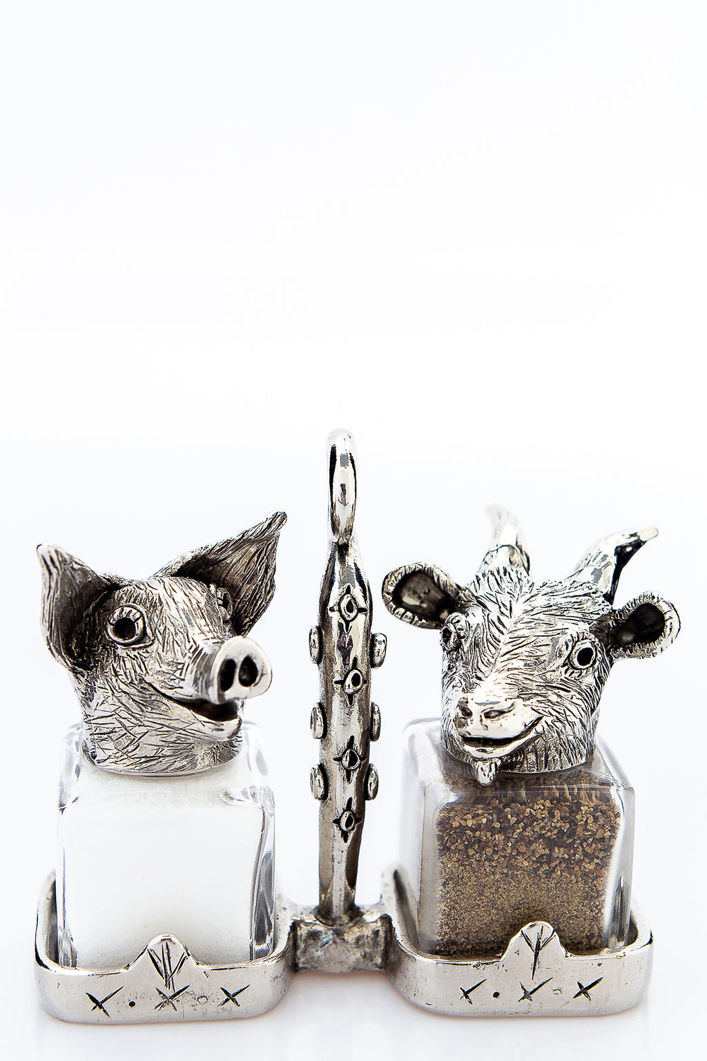 Pig and Goat salt and pepper shakers with a basket carrier, handcrafted by German artist Thomas Leiblein. American pewter, made in the USA.