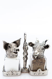Pig and Goat salt and pepper shakers with a basket carrier, handcrafted by German artist Thomas Leiblein. American pewter, made in the USA.