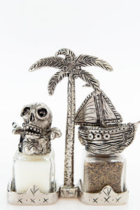 Skull and Ship salt and pepper shakers with a palm-tree carrier, handcrafted by German artist Thomas Leiblein. American pewter, made in the USA.