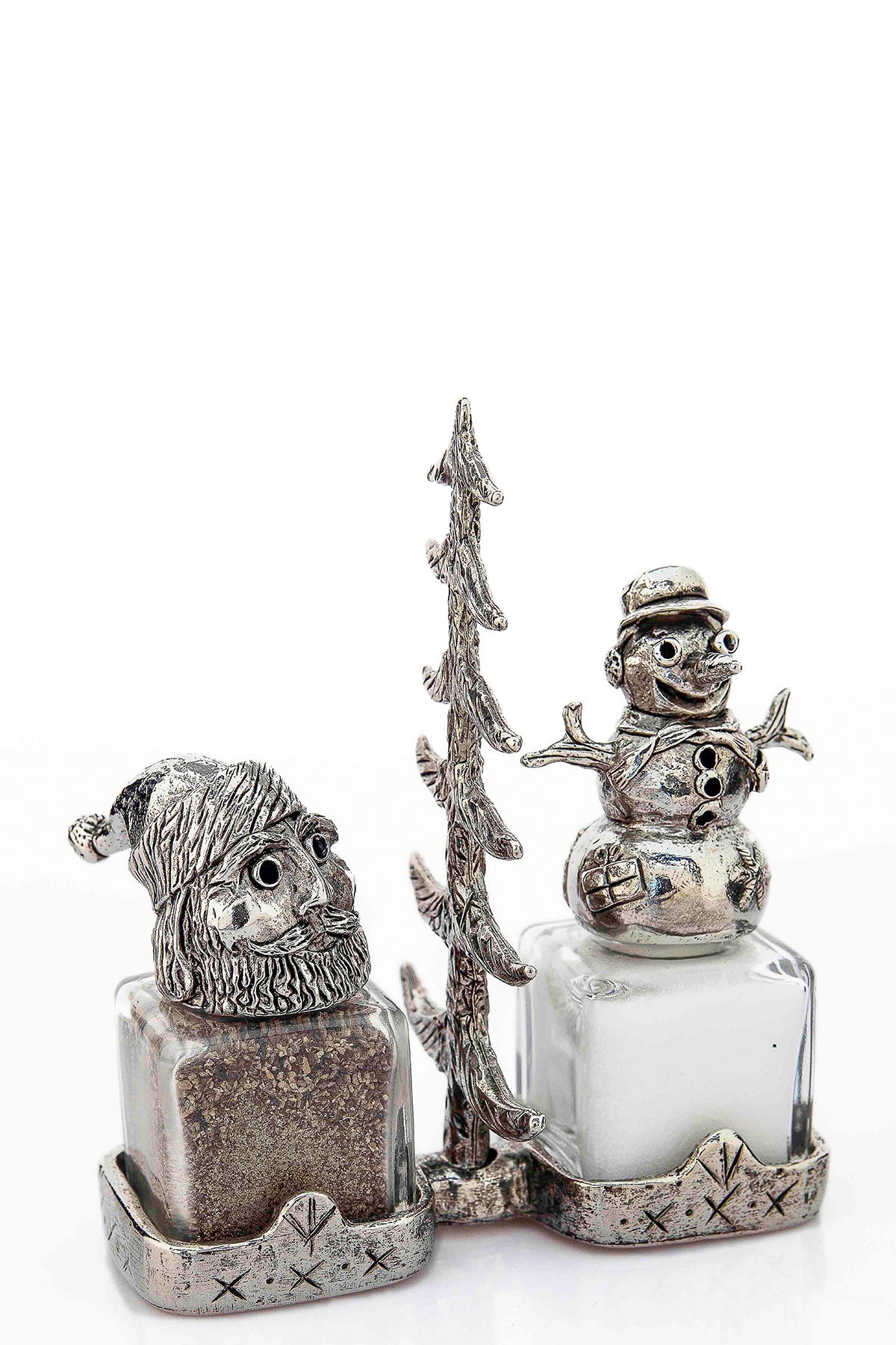 Santa Claus and snowman salt and pepper shakers, with a Christmas tree carrier. American pewter. Made in the USA.