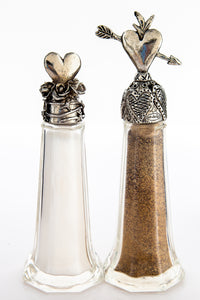 Two different hearts salt and pepper shaker set, handcrafted by German artist Thomas Leiblein. American pewter, made in the USA.