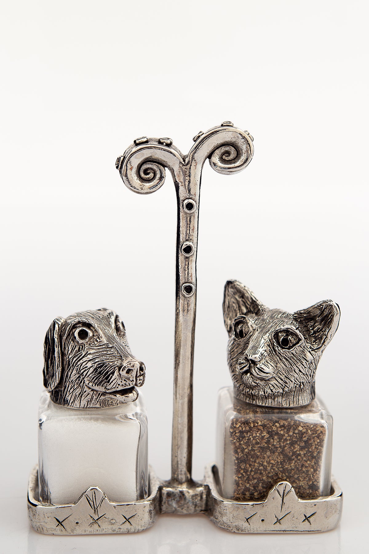 Cat and Dog salt and pepper shakers with a Renaissance carrier, handcrafted by German artist Thomas Leiblein. American pewter, made in the USA.