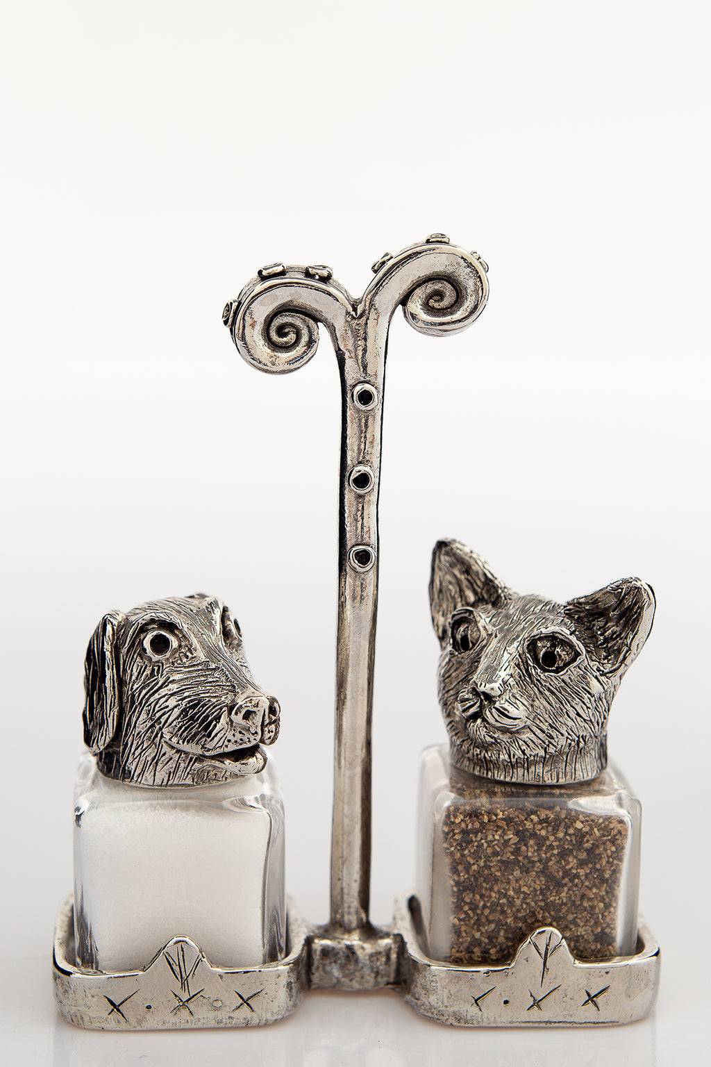 Cat and Dog salt and pepper shakers with a Renaissance carrier, handcrafted by German artist Thomas Leiblein. American pewter, made in the USA.