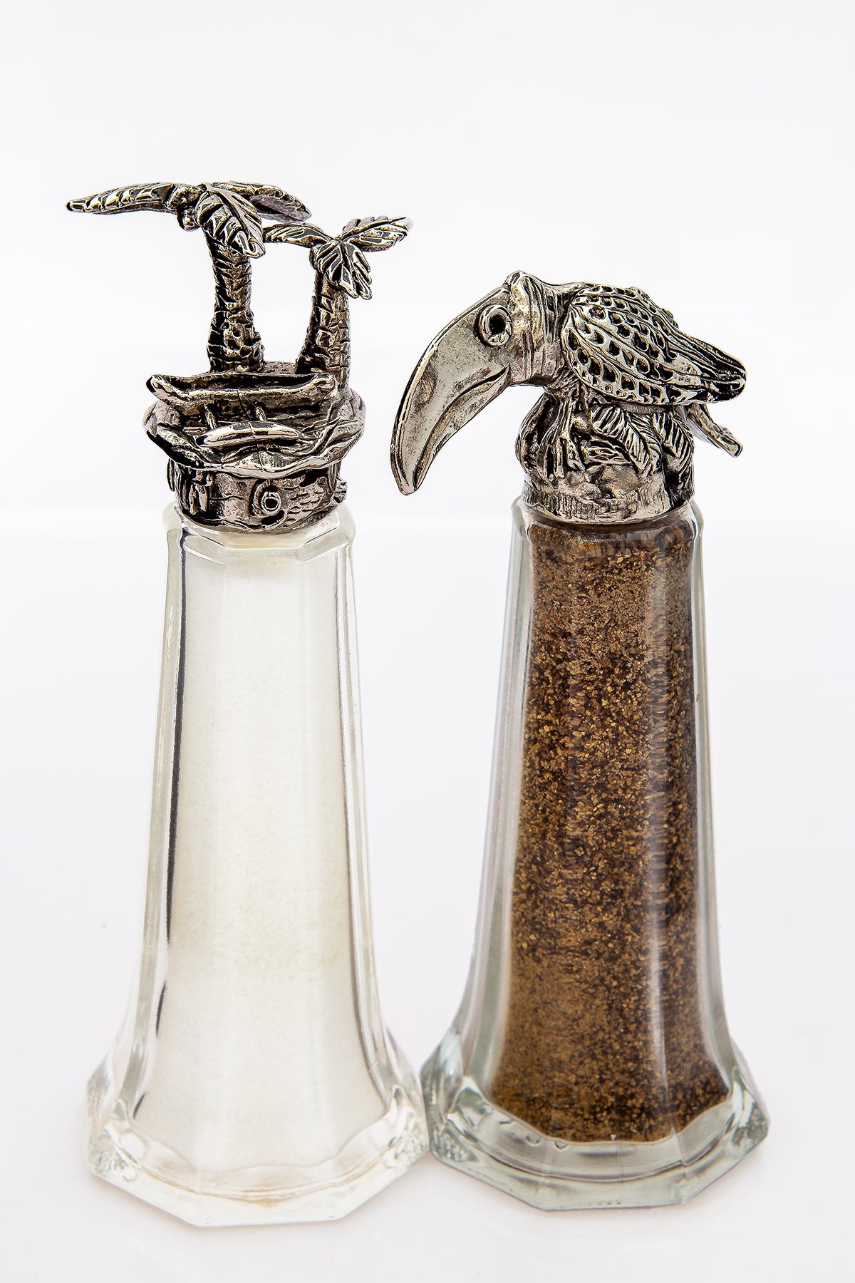 Outrigger boat and Toucan salt and pepper shaker set, handcrafted by German artist Thomas Leiblein. American pewter, made in the USA.